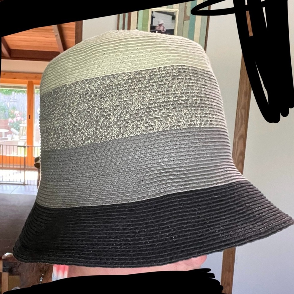 Eugenia Kim designerstraw hat with wide stripes, elegant and chic for the summer